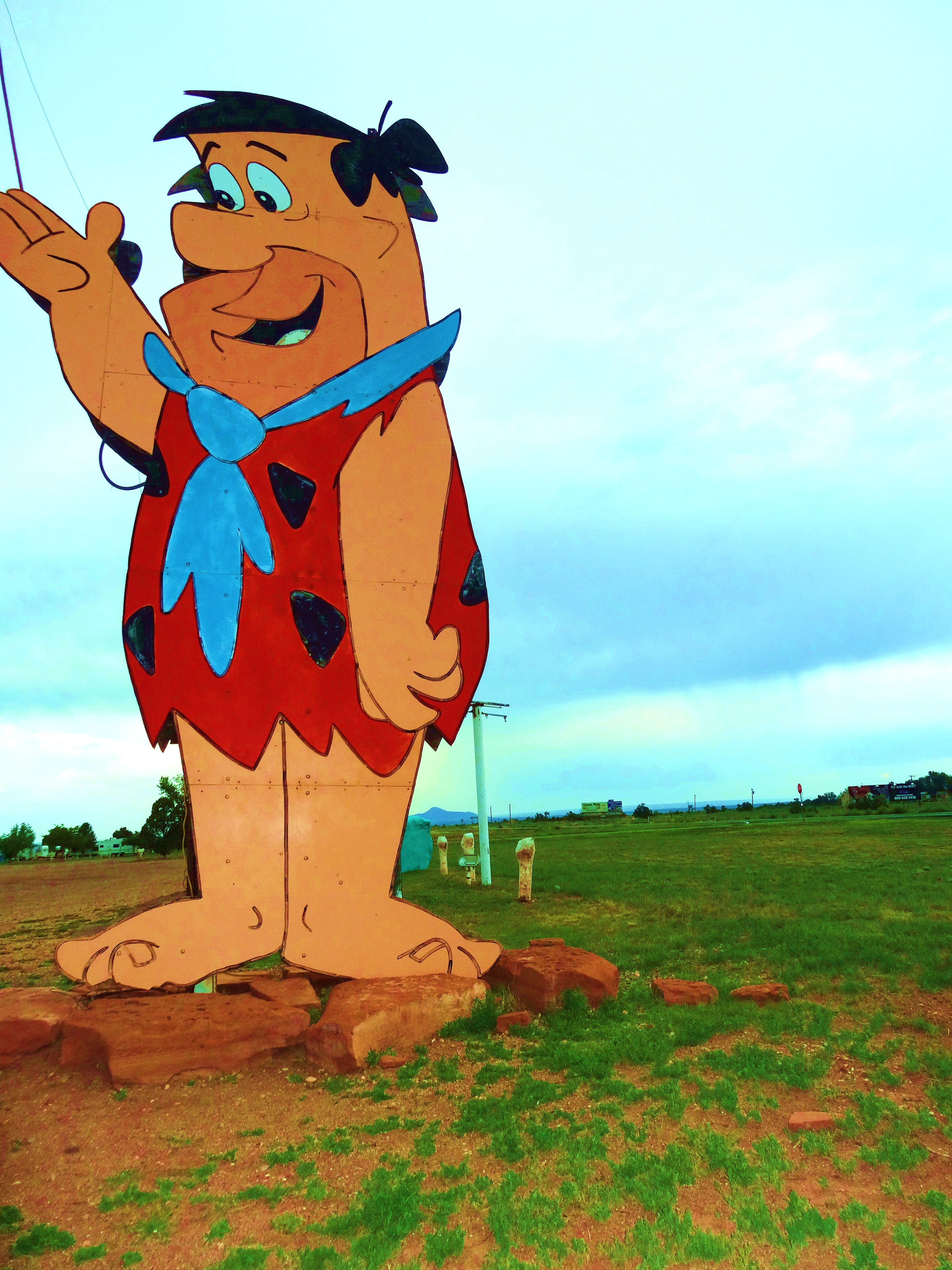 tall sign fred flintstone