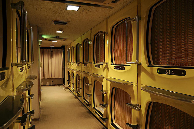 hallway of capsule hotel rooms in japan