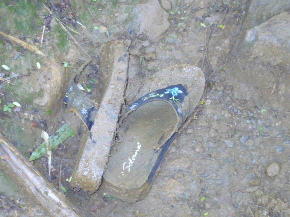 muddy flip flops