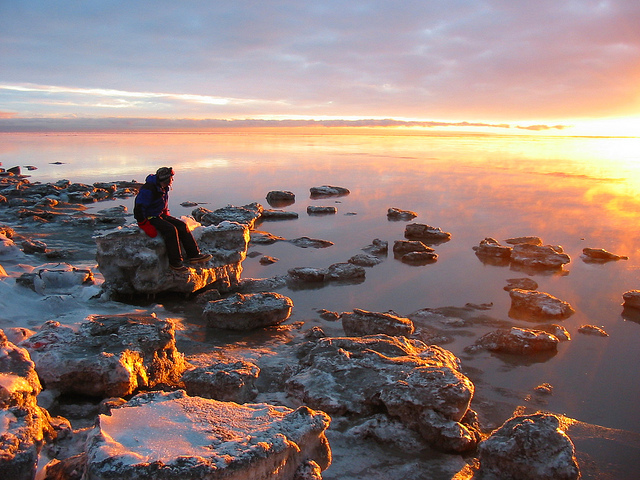 backpacker ocean at sunset