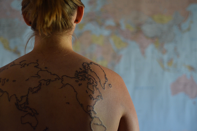travel addict tattoo