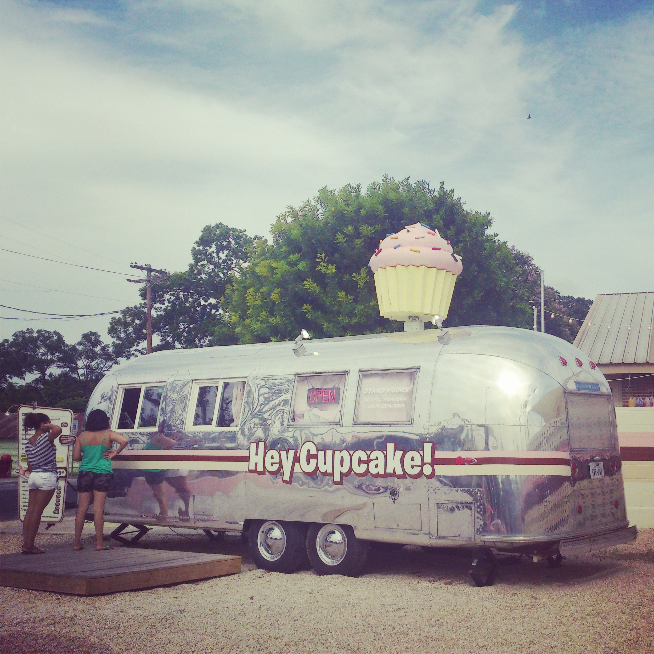 people buying cupcakes at food truck in Austin