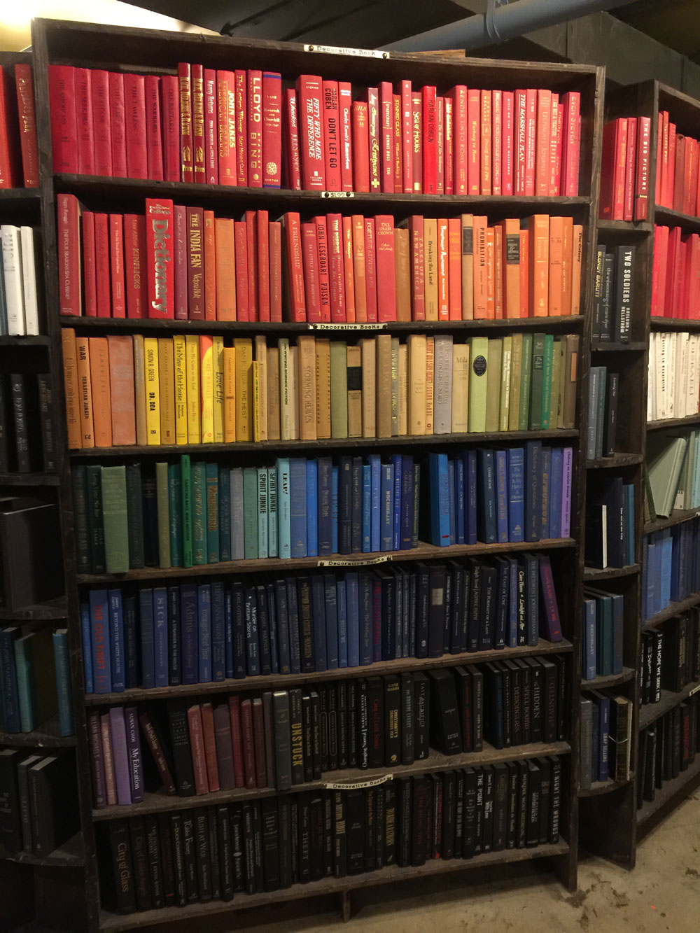 colorful books on shelves at the Last Bookstore
