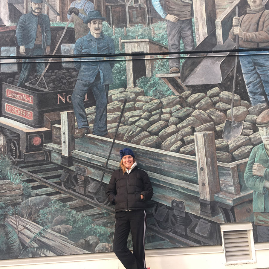 in front of mural vancouver island